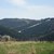 Widok na pasmo Chełmu nad Myślenicami, z wciąż naśnieżoną trasą zjazdową z niższego wierzchołka Chełmu, ze stoków Plebańskiej Góry